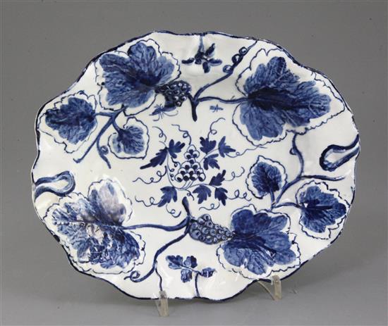 A Bow fruiting vine moulded blue and white oval dish, c.1765-70, 26cm